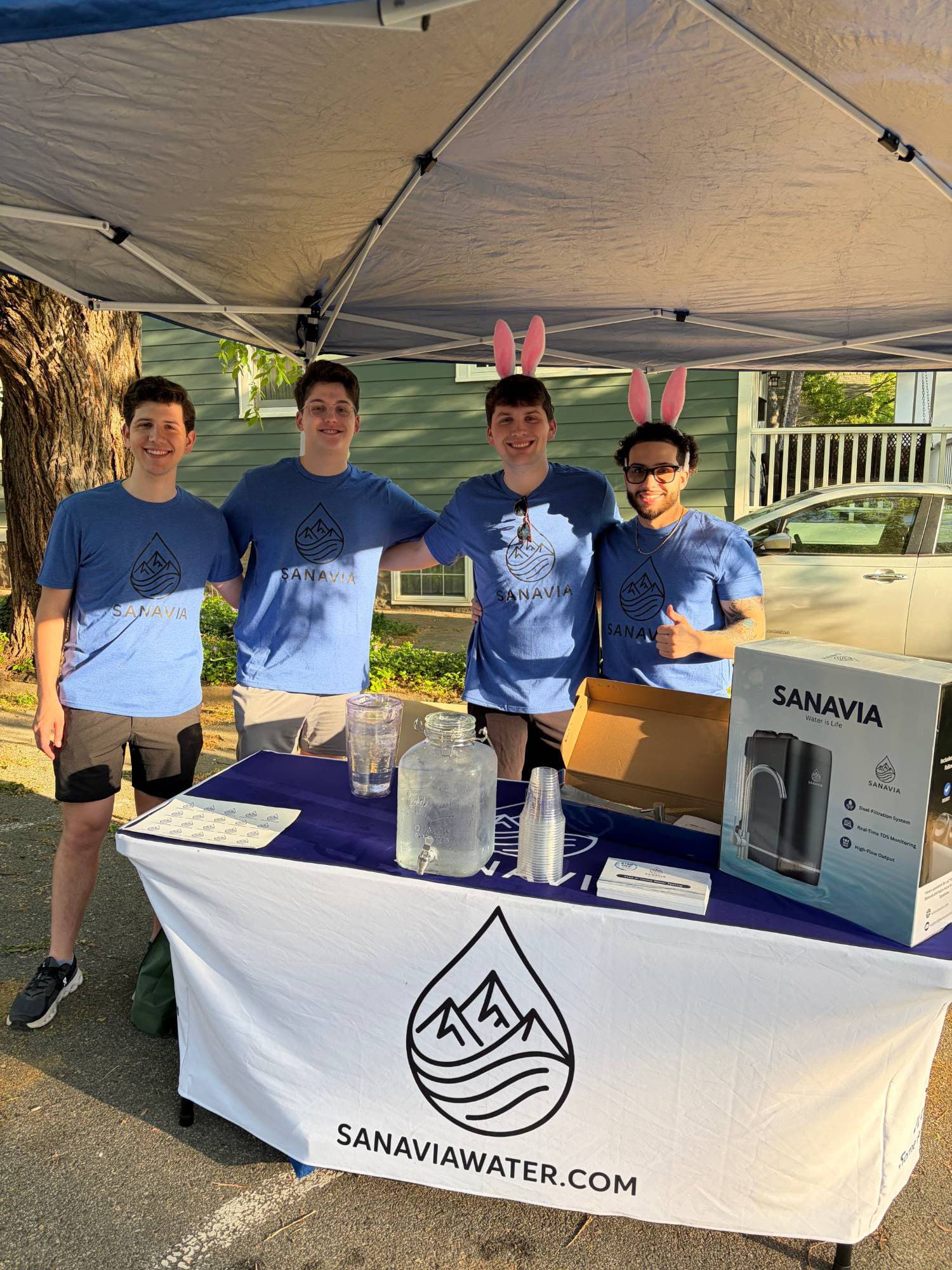 Four of the Sanavia co-founders at their booth at the Arlington Bunny Hop